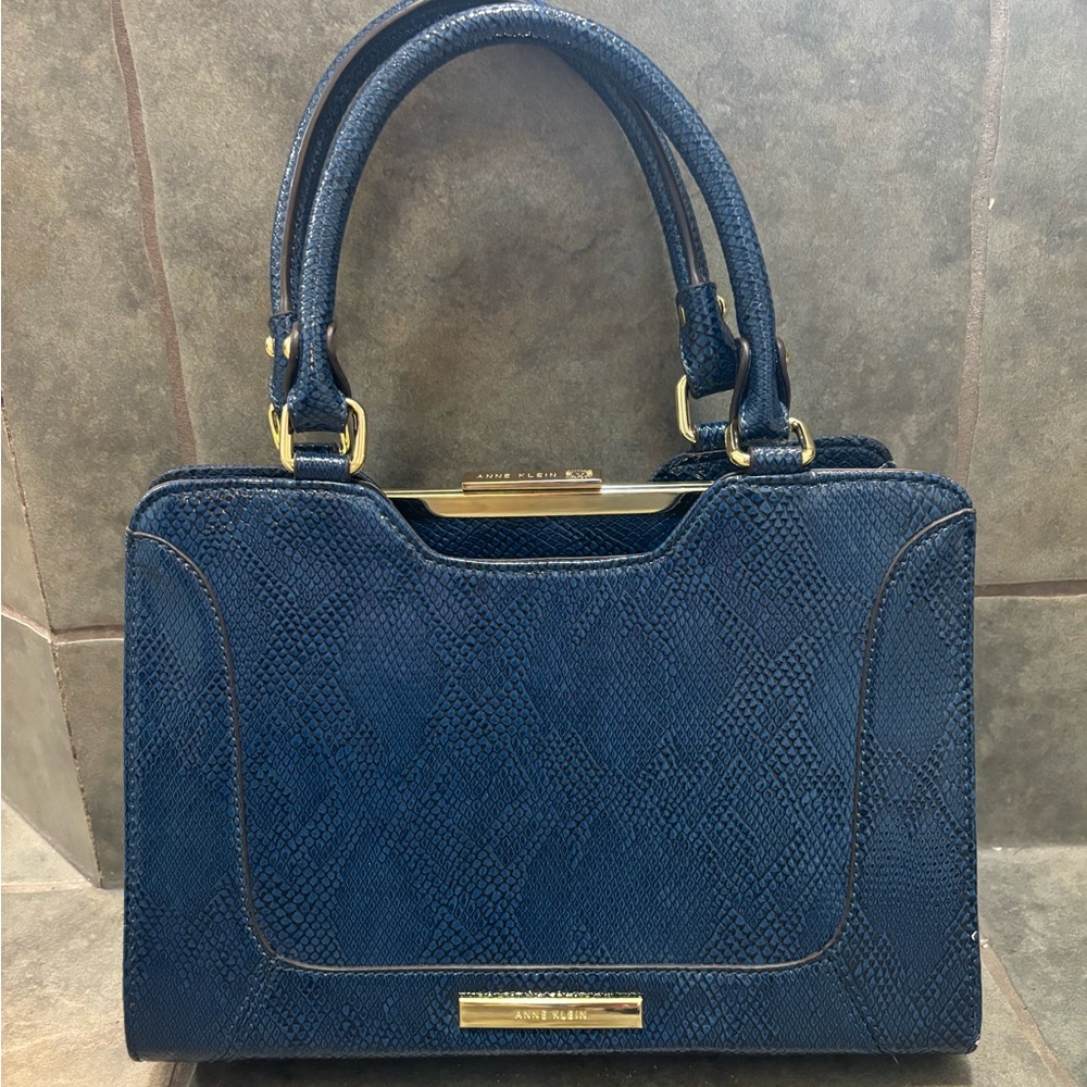 Beautiful Anne Klein dark blue tote with gold accents